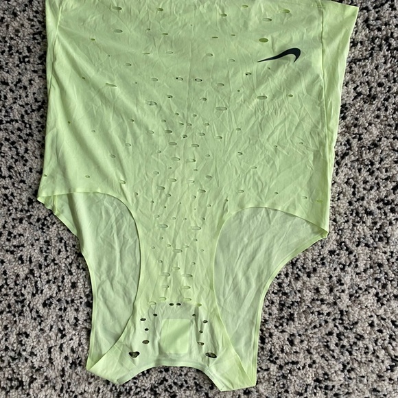 *NIKE* neon yellow running singlet. Used for competing track and filed events. - Picture 4 of 4